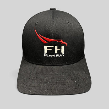 Raree Finds black SpaceX Falcon Heavy Flexfit hat with red and white embroidered logo on a structured curved brim cap