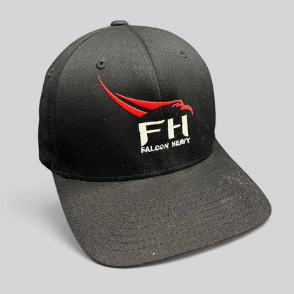 Raree Finds black SpaceX Falcon Heavy Flexfit hat with red and white embroidered logo on a structured curved brim