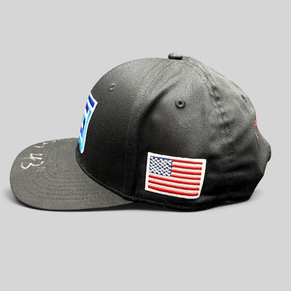 Raree Finds black snapback racing hat with embroidered Spears logo, American flag patch, and silver autograph on brim.
