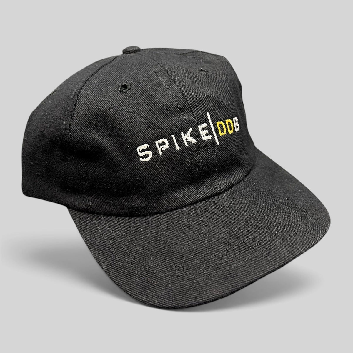 Raree Finds vintage black brushed cotton strapback hat with white and gold SPIKE | DDB embroidered logo