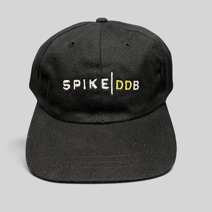 Raree Finds vintage black brushed cotton strapback hat with white and gold embroidered Spike DDB creative agency logo