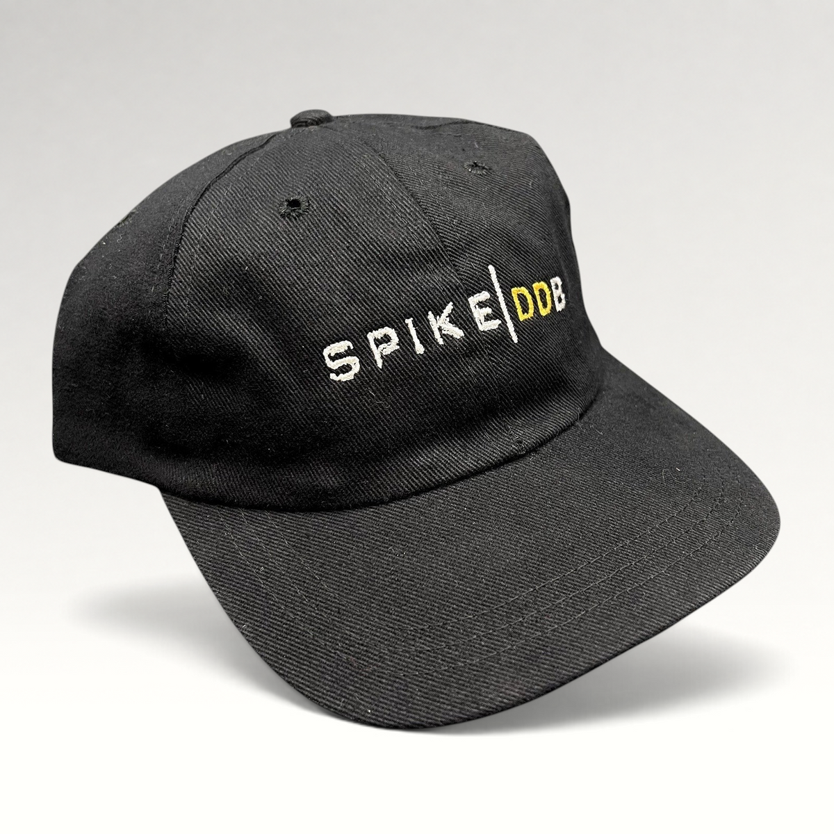 Raree Finds vintage black brushed cotton strapback hat with white and gold embroidered SPIKE DDB logo