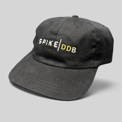 Raree Finds vintage black brushed cotton strapback hat with white and gold embroidered SPIKE DDB creative agency logo