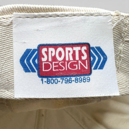 Raree Finds vintage Sports Design label inside a NASCAR snapback hat with blue and red logo text