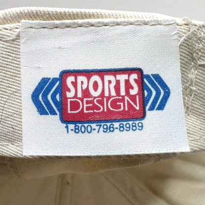 Raree Finds vintage Sports Design label inside a NASCAR snapback hat with blue and red logo text