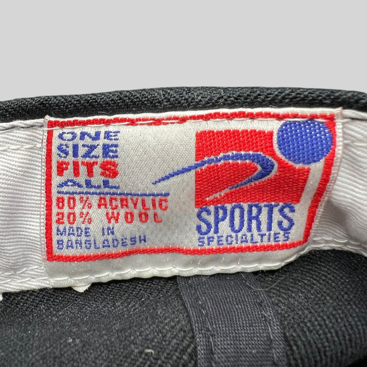 Raree Finds vintage Sports Specialties snapback hat interior label showing material and origin details