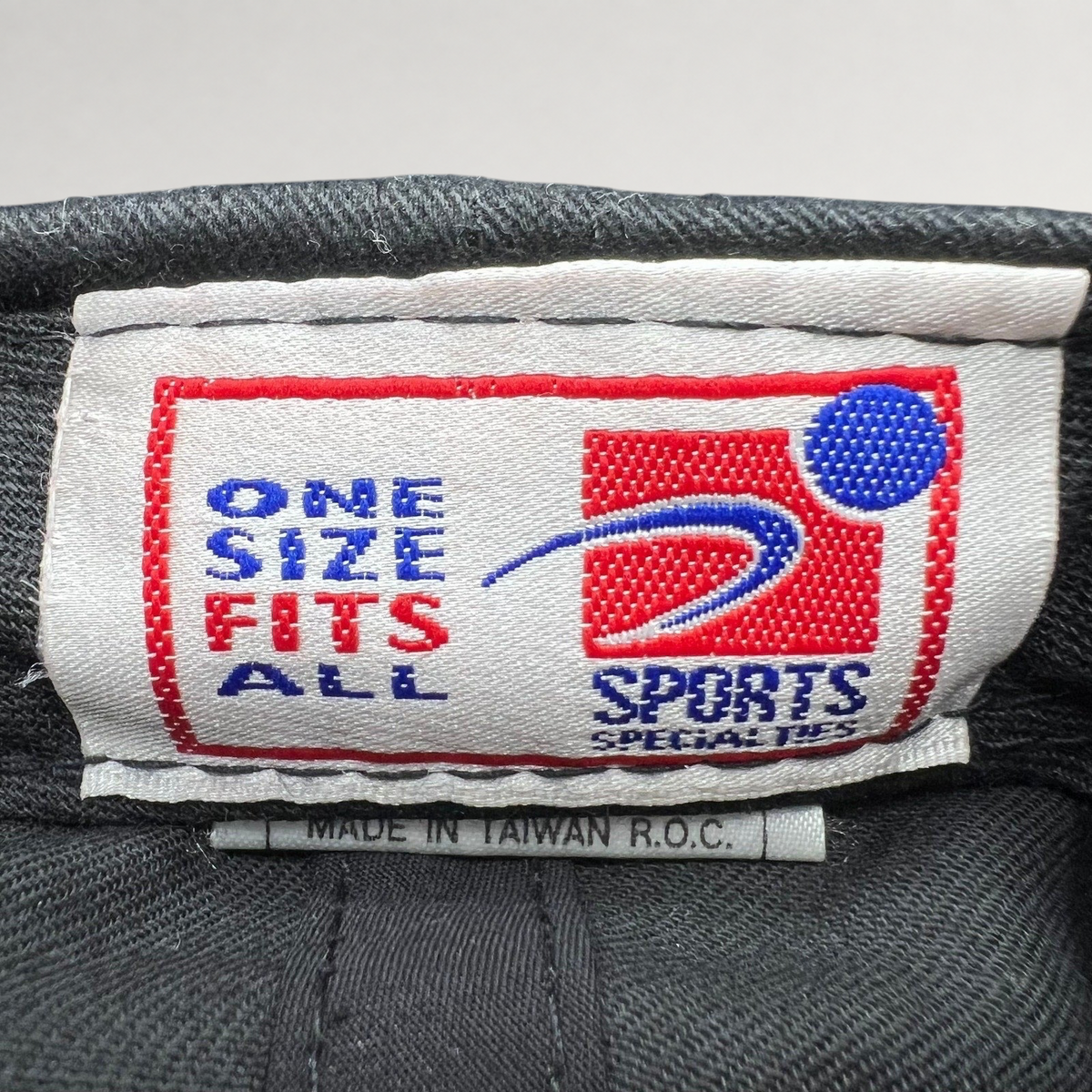 Raree Finds vintage Sports Specialties snapback interior label showing One Size Fits All and Made in Taiwan R.O.C.