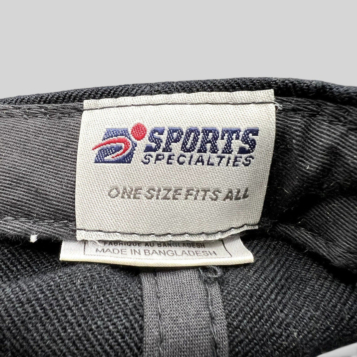Raree Finds vintage Sports Specialties snapback hat interior label with One Size Fits All branding