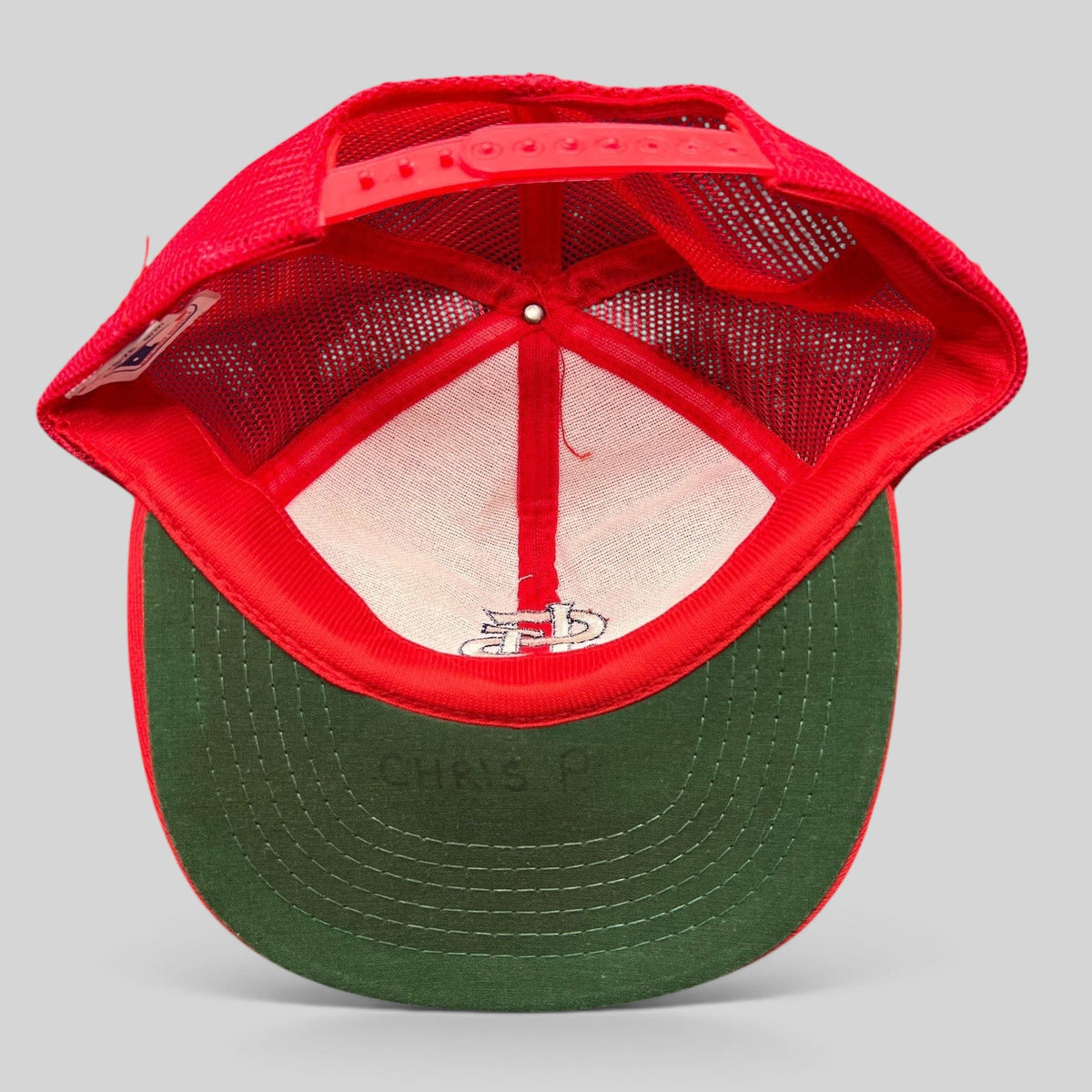 Raree Finds vintage St. Louis Cardinals mesh snapback hat with red crown, green undervisor, and MLB license tag.