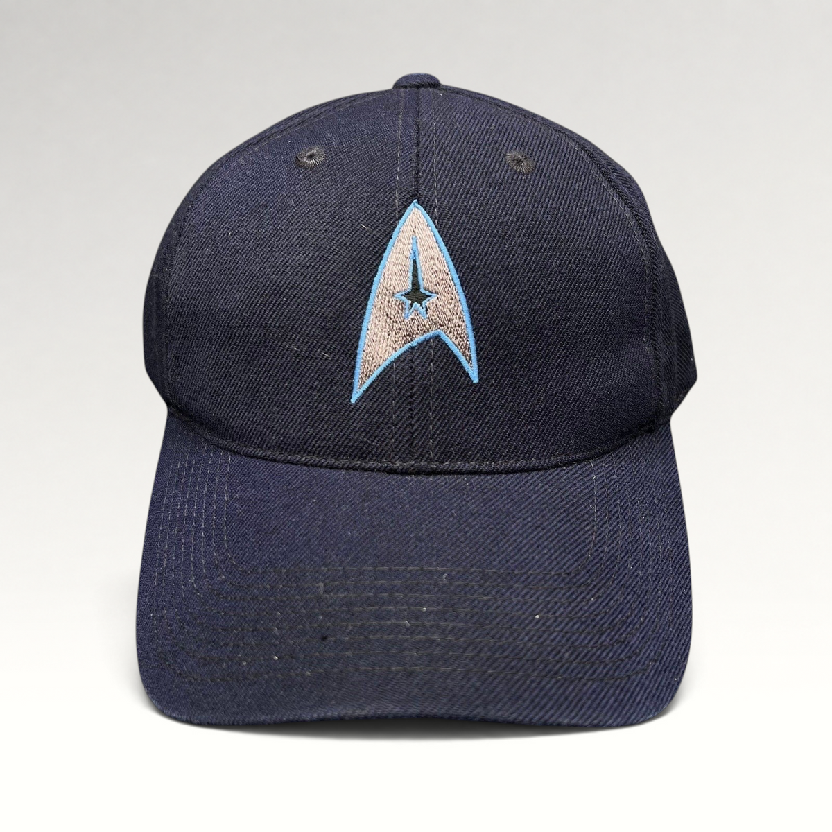 Raree Finds navy blue cotton twill Star Trek 2009 film crew strapback hat with embroidered Starfleet delta insignia