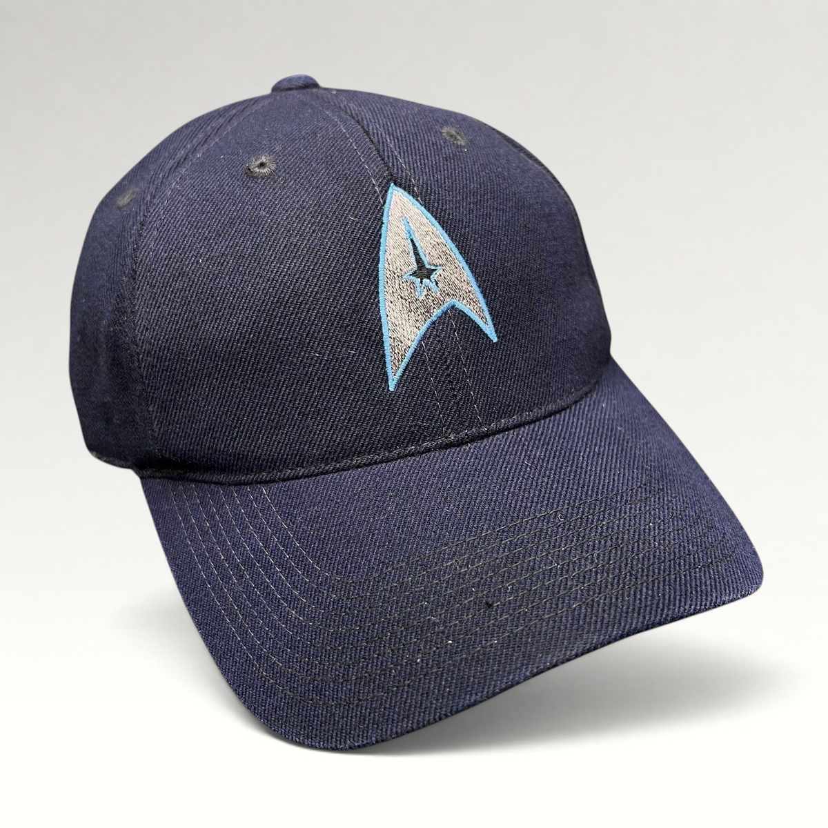 Raree Finds navy blue cotton twill Star Trek 2009 crew strapback hat with embroidered Starfleet delta insignia