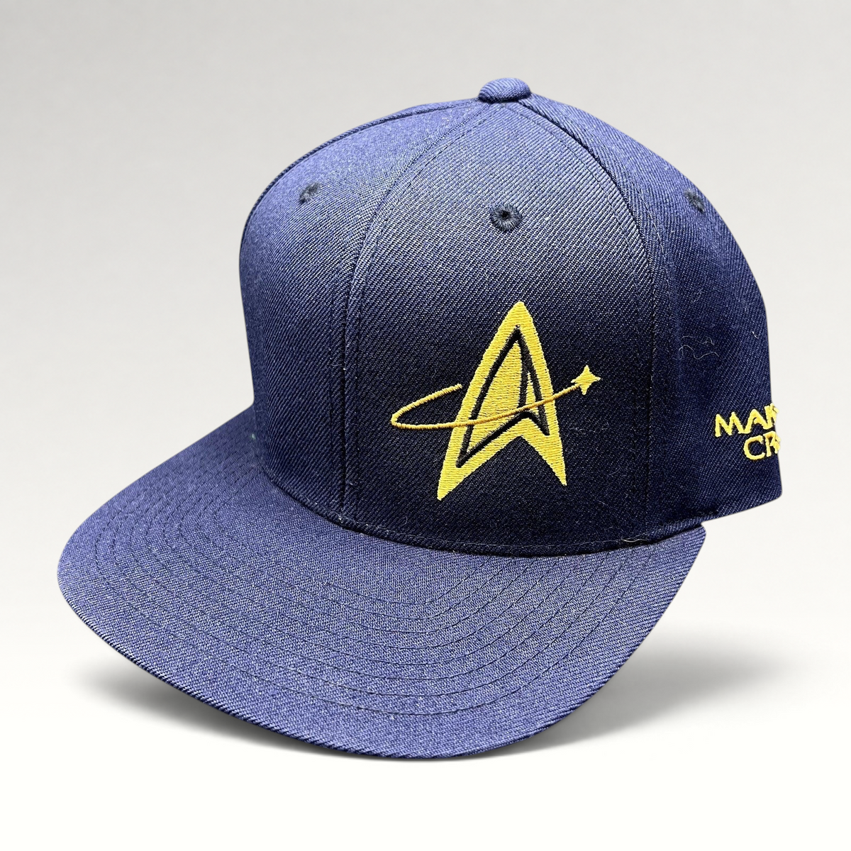 Raree Finds vintage navy Star Trek Starfleet Academy snapback hat with gold embroidered insignia and crew branding