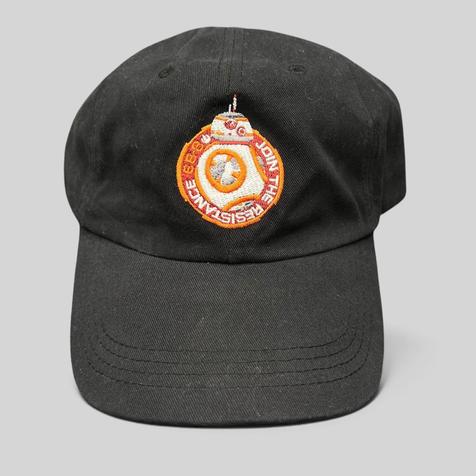 Raree Finds black cotton Star Wars Force Awakens BB-8 cast and crew strapback hat with embroidered Resistance emblem.