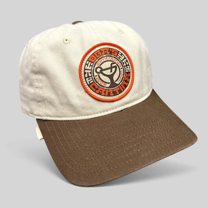 Raree Finds Star Wars Galactic Sentients dad cap with a cream crown, brown curved brim, and embroidered circular patch.