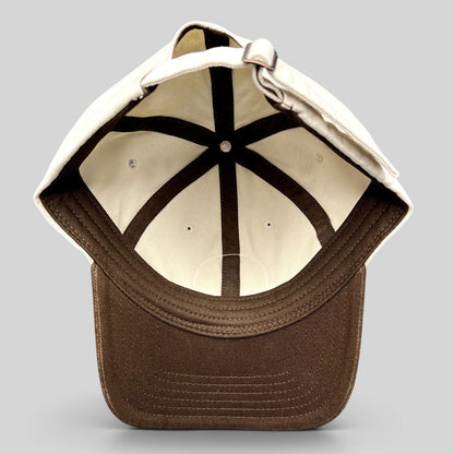 Raree Finds Star Wars Galactic Sentients dad hat interior view showing cream crown, brown brim, and strapback closure.