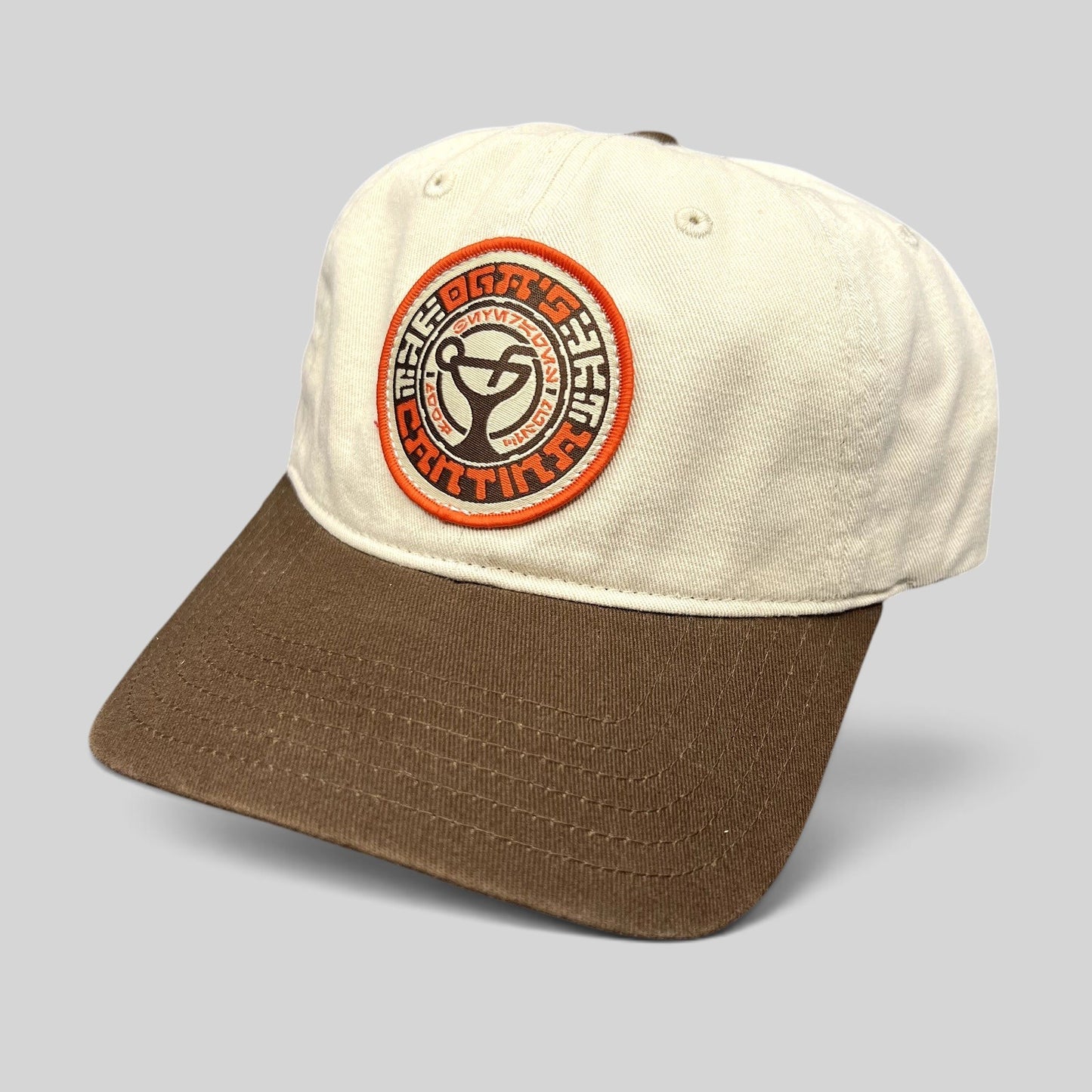 Raree Finds Star Wars Galactic Sentients dad hat with a cream crown, brown brim, and circular embroidered patch.