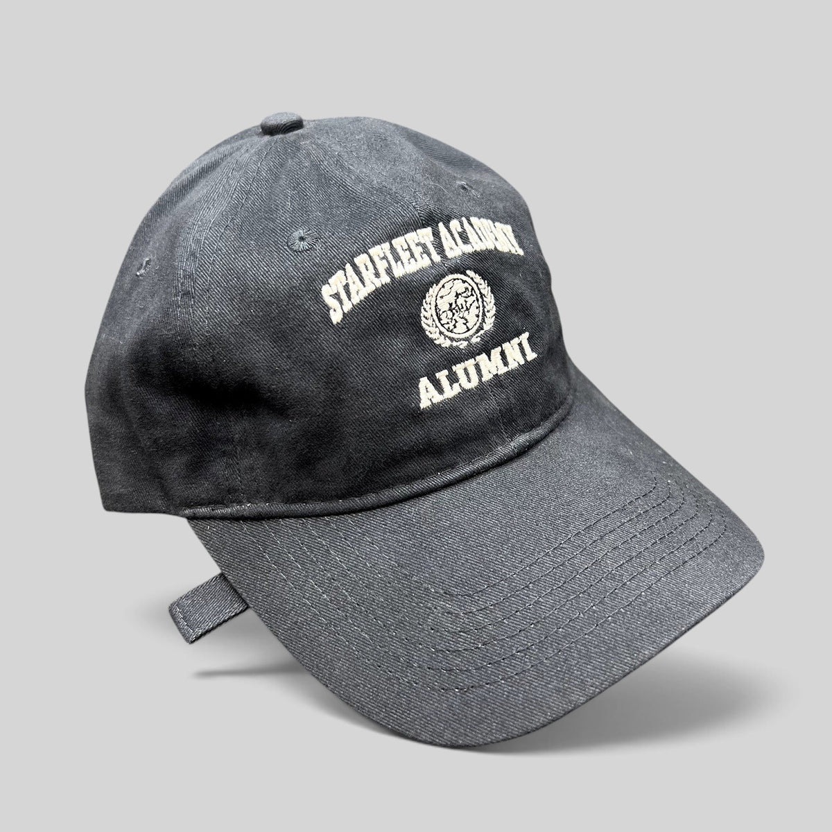 Raree Finds navy blue cotton Starfleet Academy Alumni strapback hat with embroidered crest and curved brim
