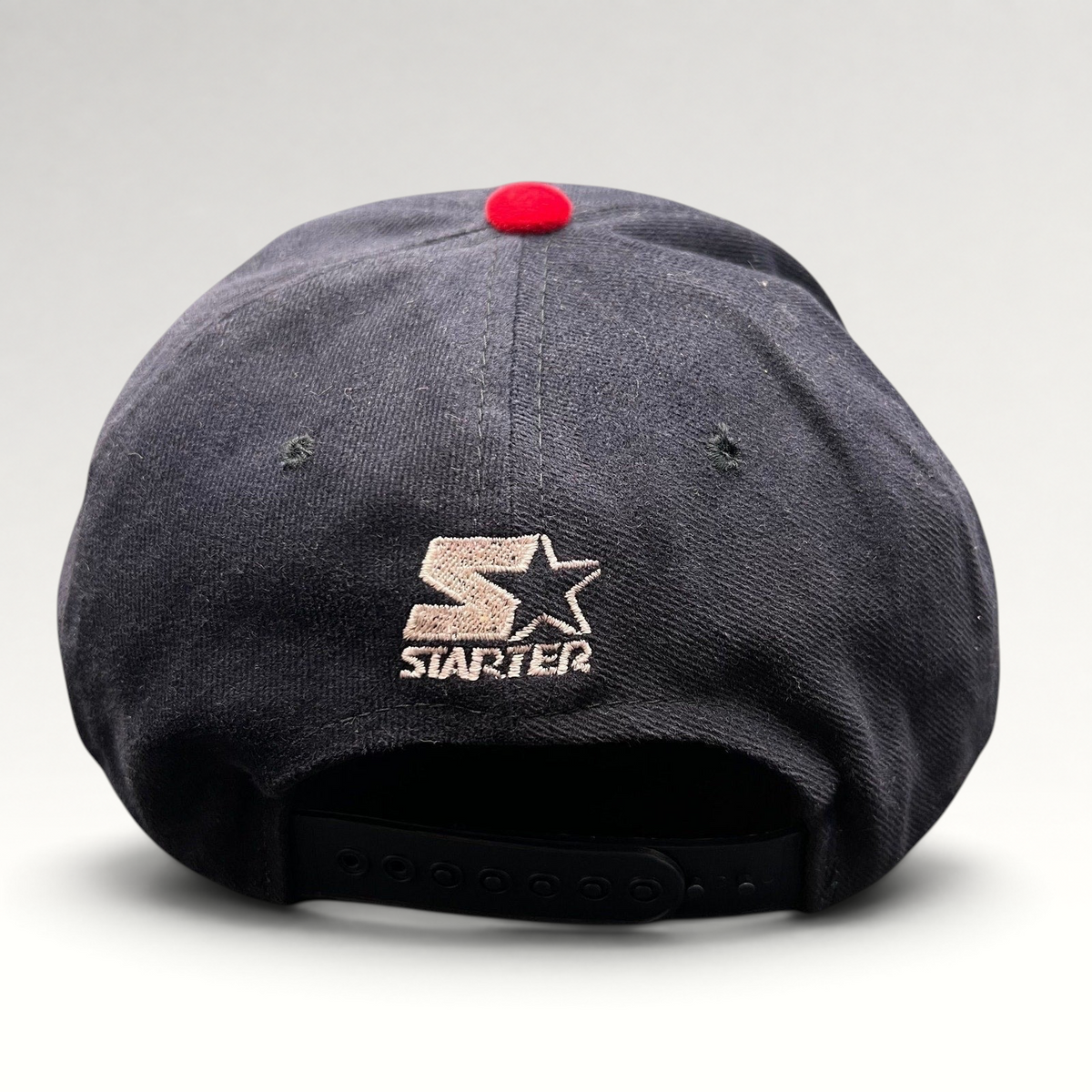 Raree Finds vintage 1996 Atlanta Olympics Starter snapback hat back view showing embroidered logo and black snap closure