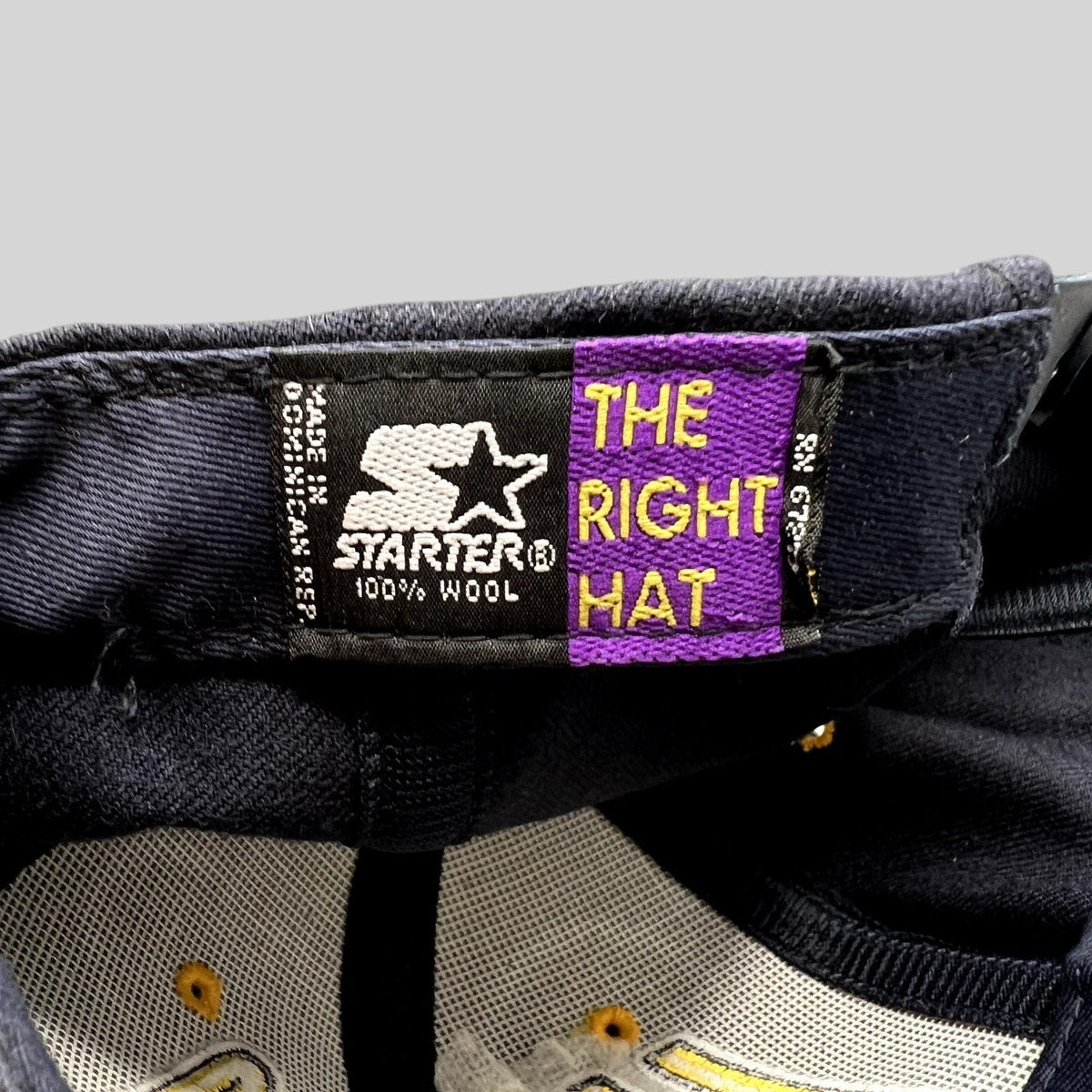 Raree Finds vintage Starter The Right Hat wool snapback interior label detail with navy and gold collegiate branding