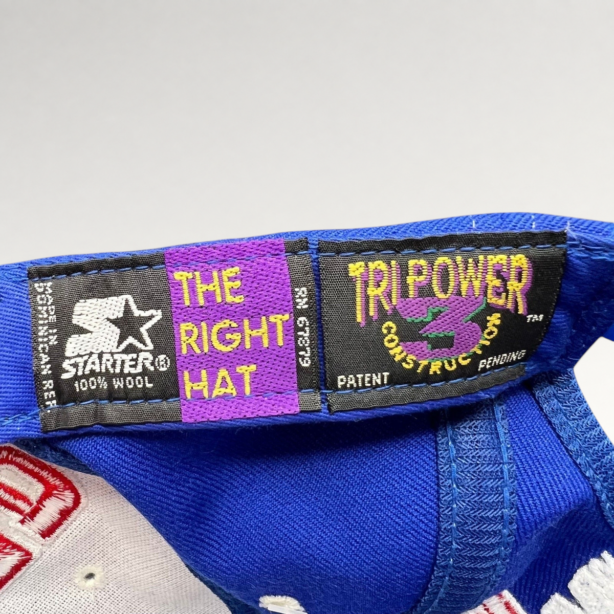 Raree Finds vintage Starter Tri-Power wool hat interior label with 100% wool and construction details