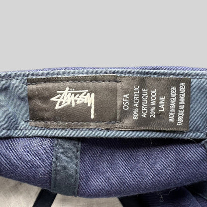 Raree Finds Stussy navy strapback hat interior label showing acrylic and wool blend material and brand logo