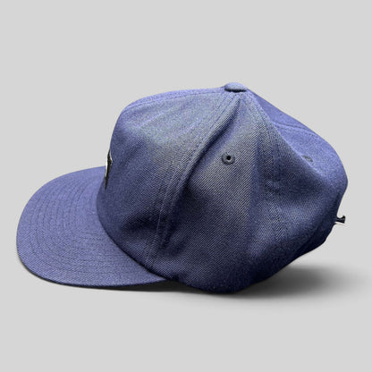 Raree Finds Stussy navy blue strapback hat with a minimalist box logo patch and structured flat brim design.