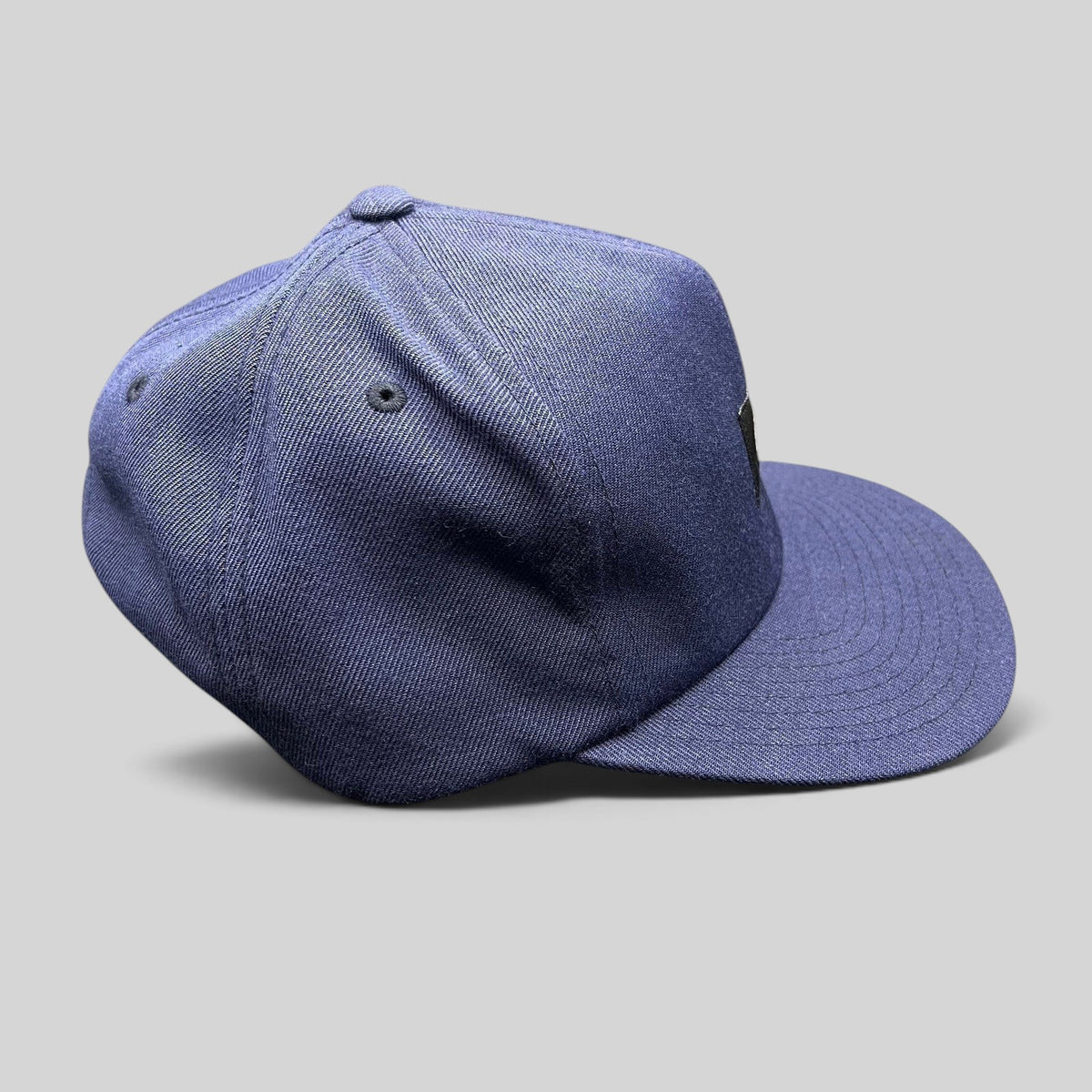 Raree Finds navy Stussy strapback hat with structured crown and flat brim in an acrylic wool blend