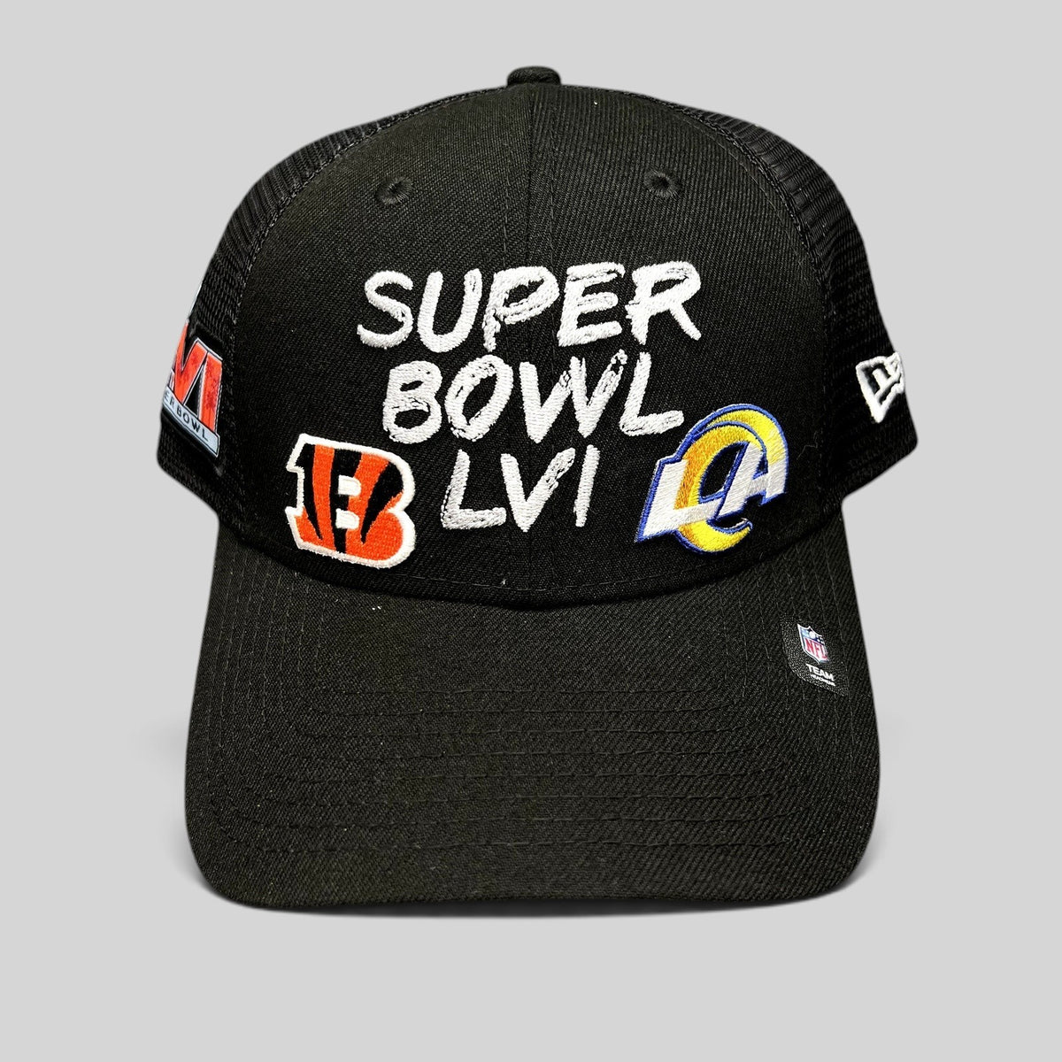 Raree Finds black New Era Super Bowl LVI trucker snapback hat with Bengals and Rams embroidered team logos.