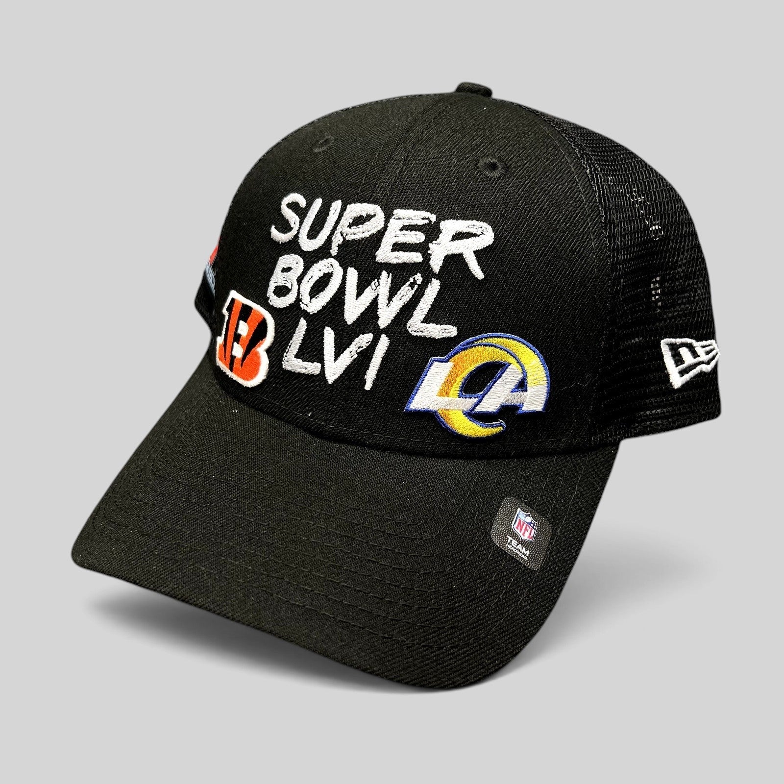 Raree Finds black New Era Super Bowl LVI trucker snapback hat with Bengals and Rams logos and mesh back panels.