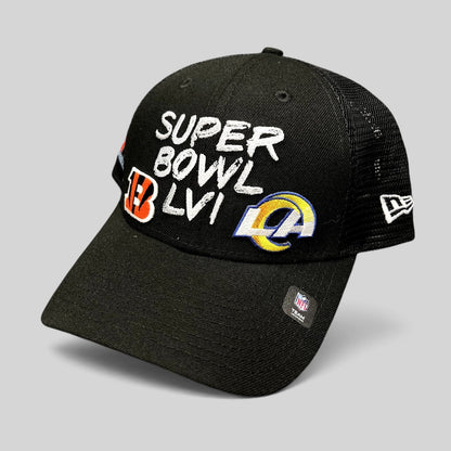 Raree Finds black New Era Super Bowl LVI trucker snapback hat with Bengals and Rams logos and mesh back panels.