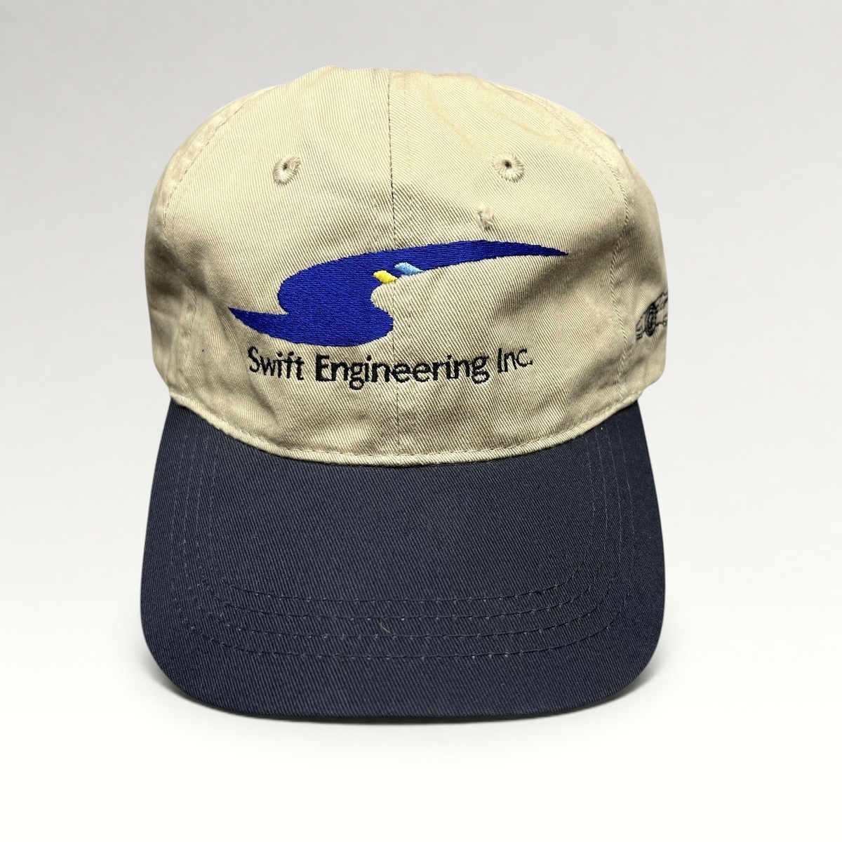 Raree Finds vintage Swift Engineering Inc two-tone khaki and navy cotton strapback hat with embroidered logo