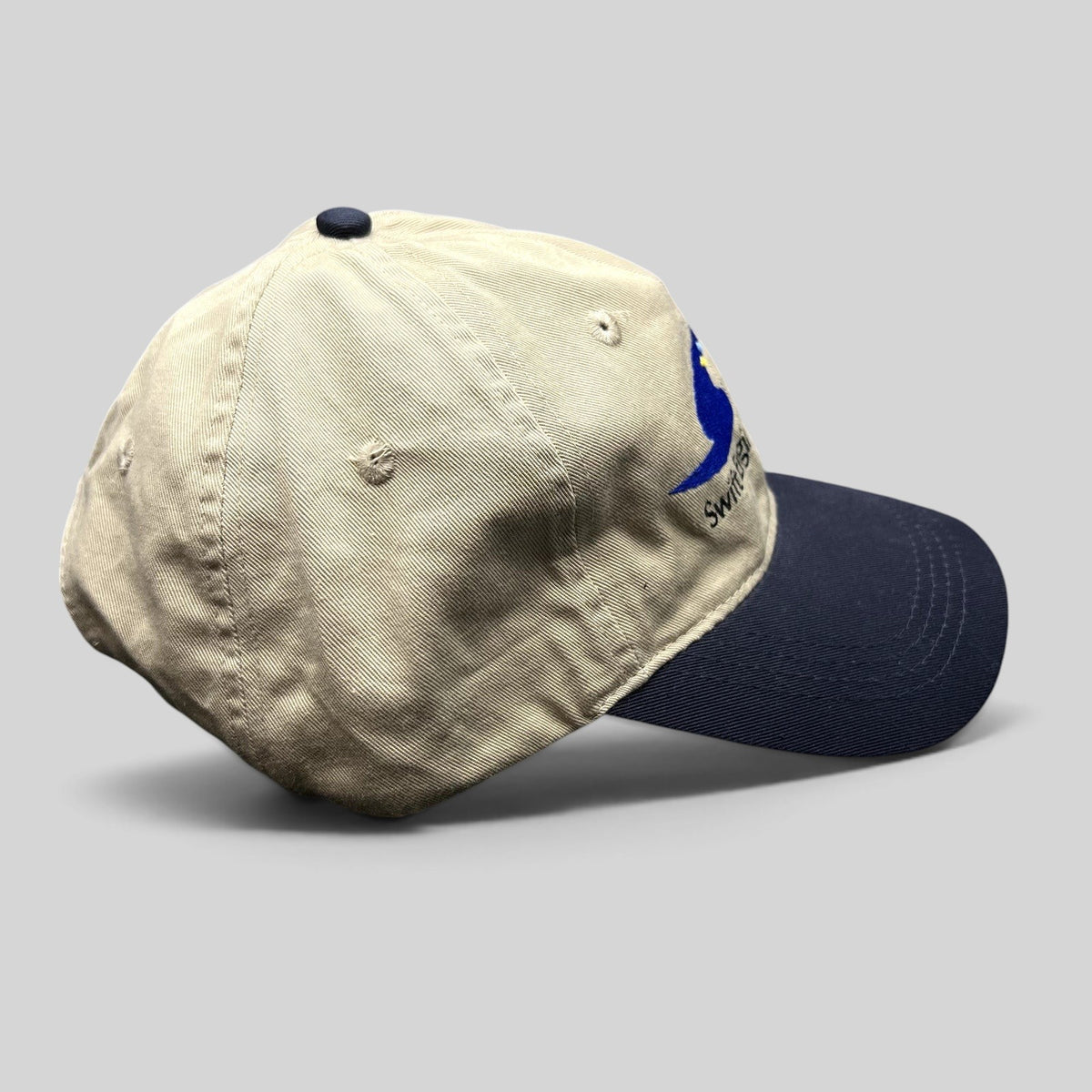 Raree Finds vintage Swift Engineering Inc two-tone khaki and navy cotton strapback hat with embroidered logo