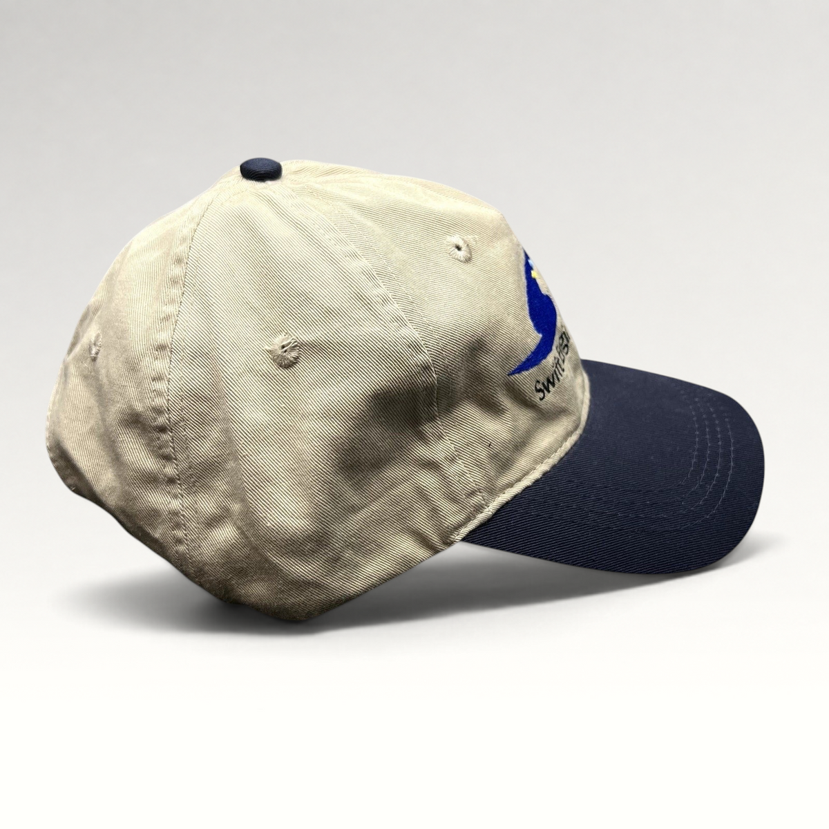 Raree Finds vintage Swift Engineering Inc two-tone khaki and navy cotton strapback hat with embroidered logo