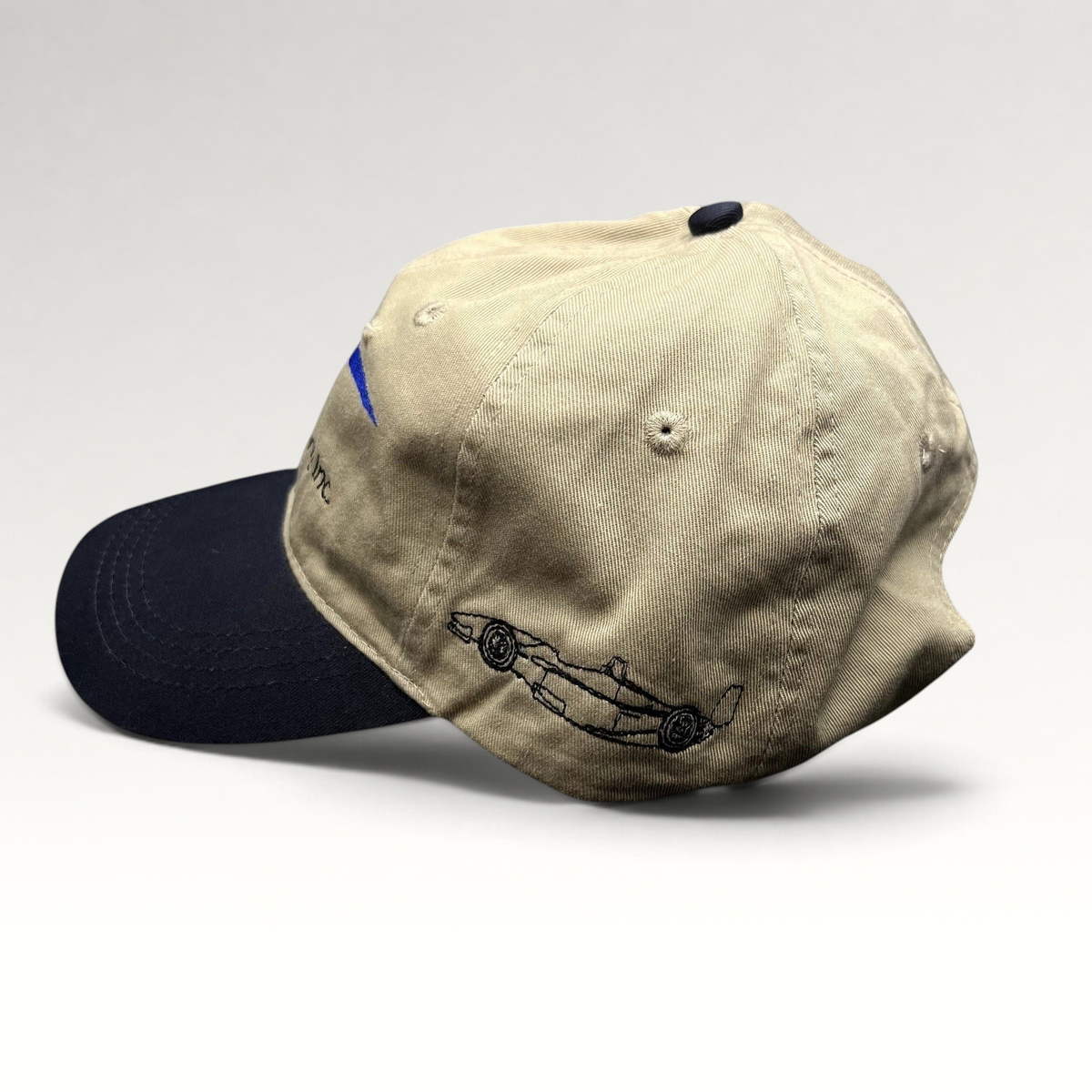 Raree Finds vintage Swift Engineering Inc two-tone khaki and navy cotton strapback hat with Indy car embroidery.