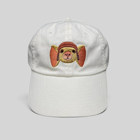 Raree Finds white cotton youth strapback hat featuring an embroidered Tale of Despereaux mouse character on the front.