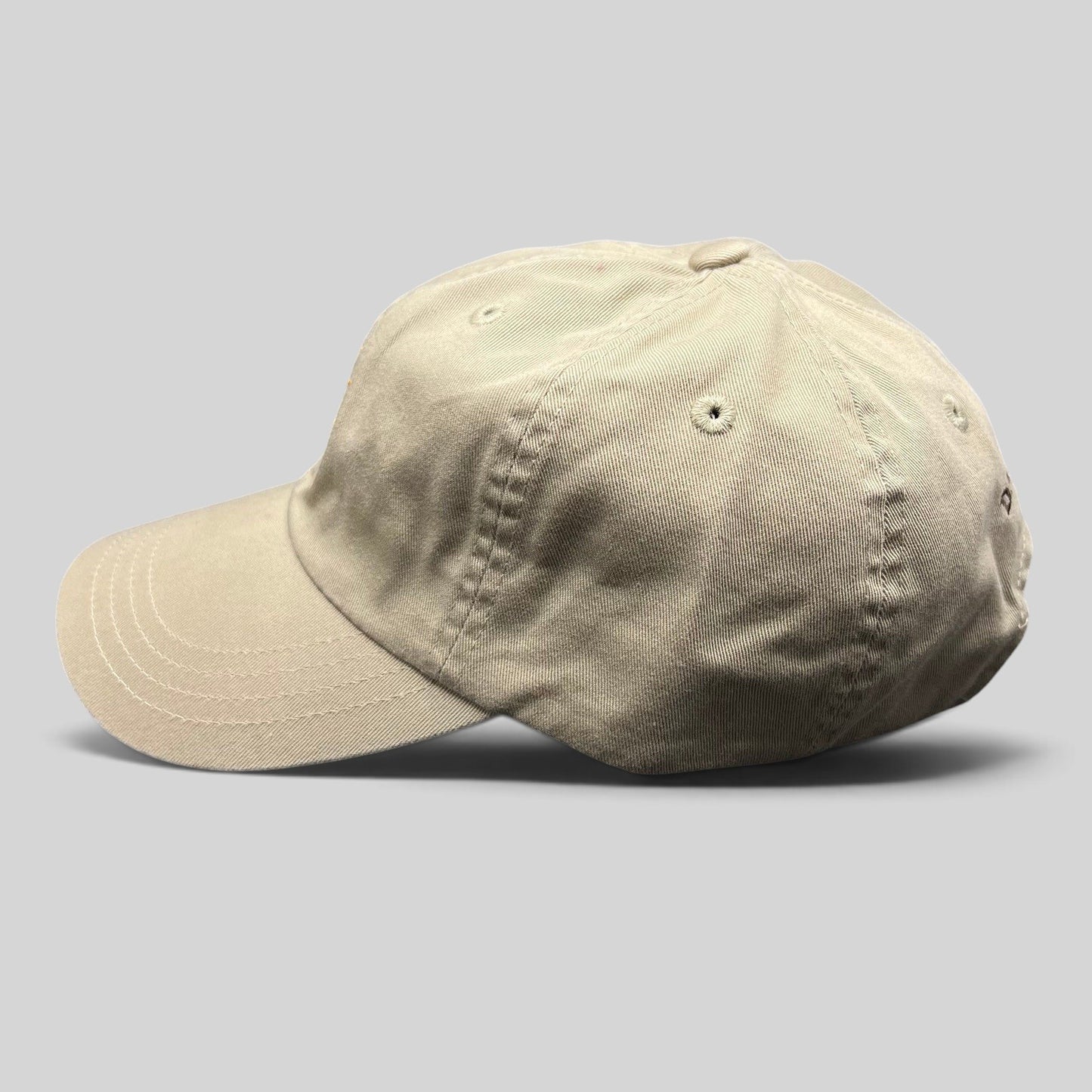 Raree Finds vintage tan cotton strapback hat with unstructured fit and classic baseball cap silhouette