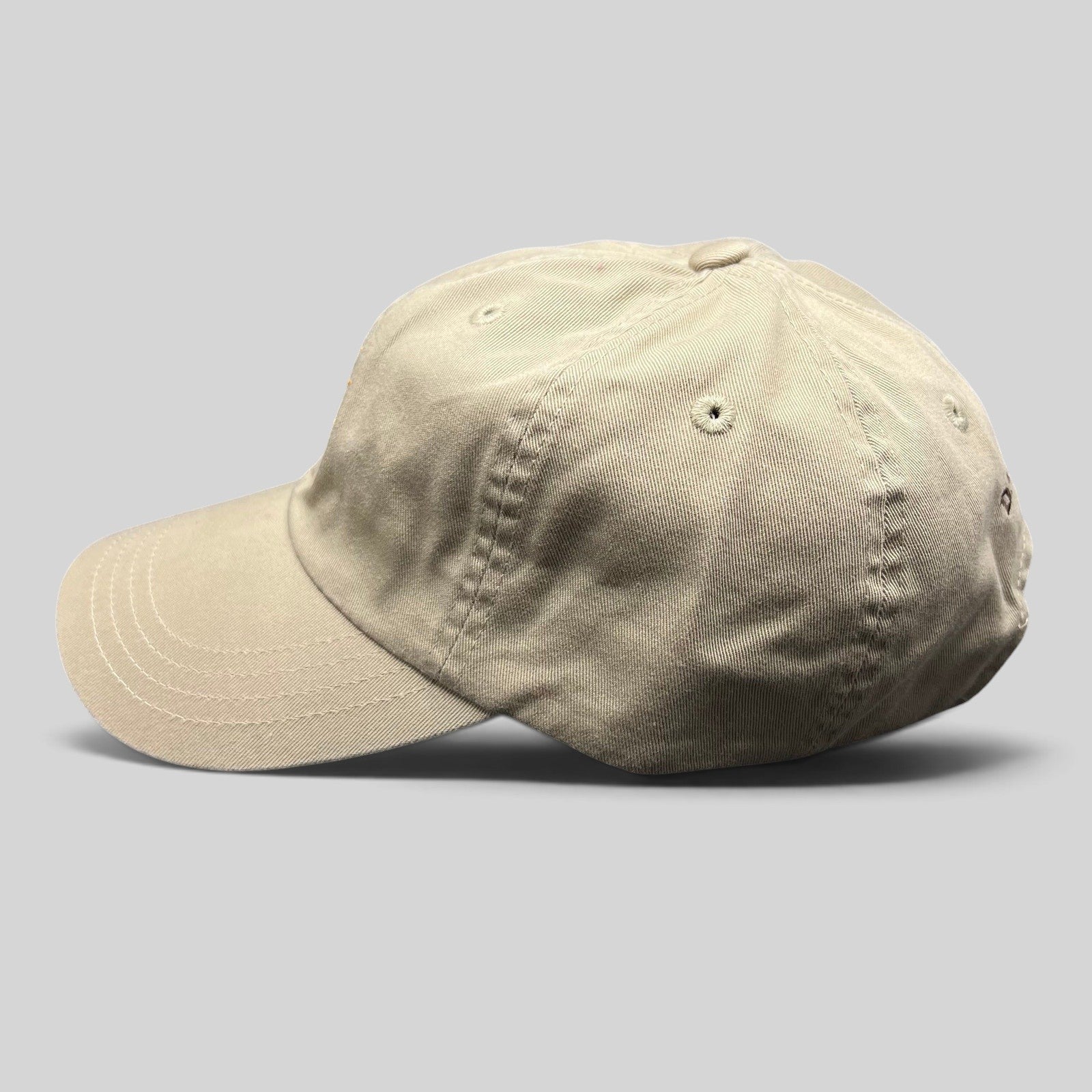 Raree Finds vintage tan cotton strapback hat with unstructured fit and classic baseball cap silhouette