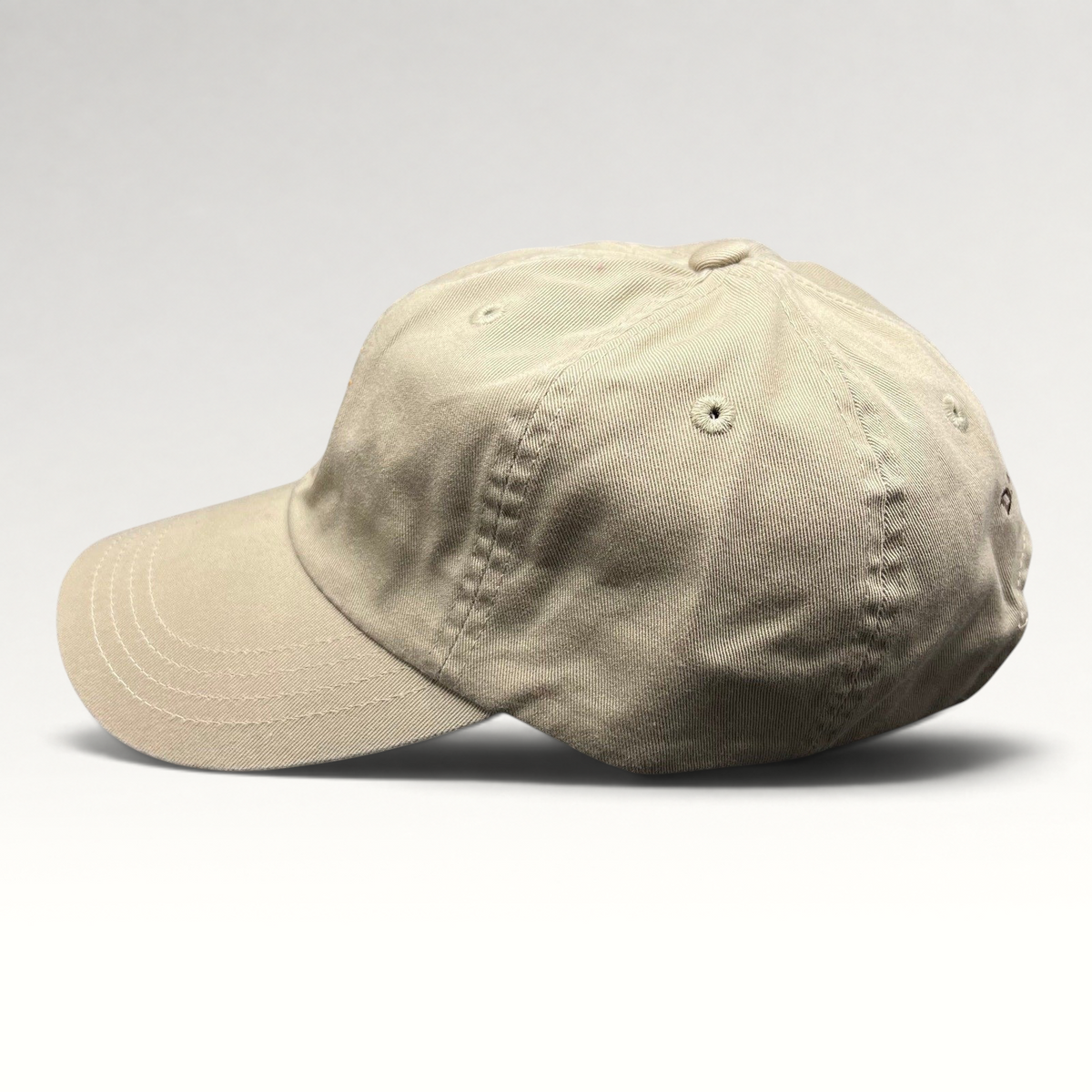 Raree Finds vintage tan cotton strapback hat with unstructured fit and classic baseball cap silhouette