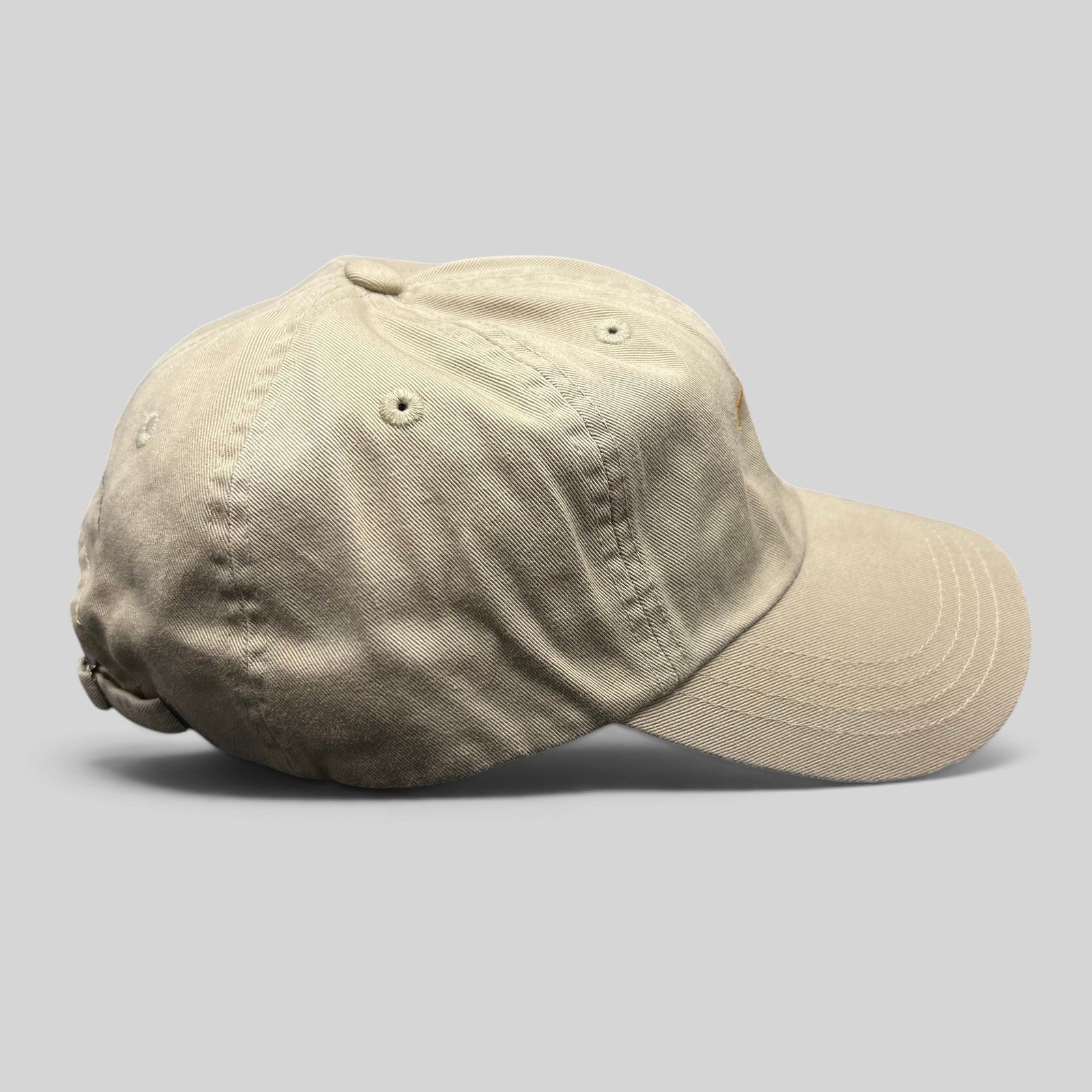 Raree Finds vintage tan cotton strapback hat with unstructured fit and minimalist dancing bear embroidery