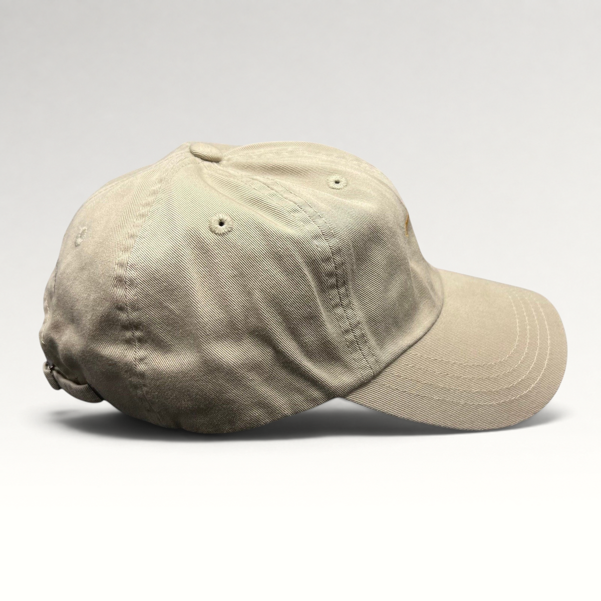 Raree Finds vintage tan cotton strapback hat with unstructured fit and minimalist dancing bear embroidery