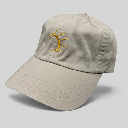Raree Finds vintage tan cotton strapback hat with minimalist gold embroidered dancing bear graphic