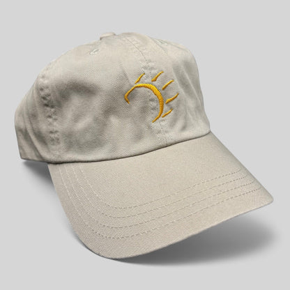 Raree Finds vintage tan cotton strapback hat with a minimalist gold embroidered dancing bear graphic
