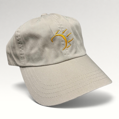 Raree Finds vintage tan cotton strapback hat with a minimalist gold embroidered dancing bear graphic
