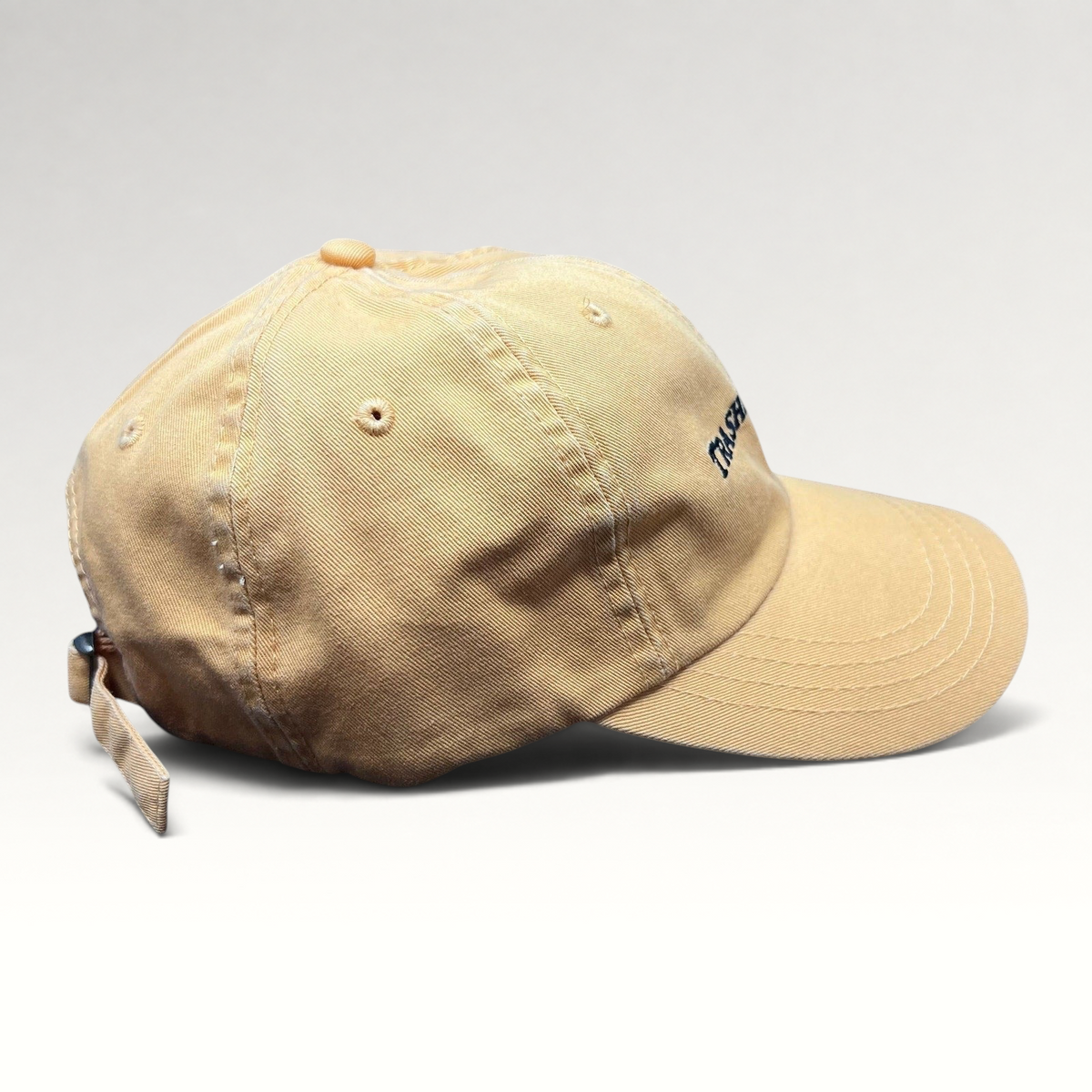 Raree Finds vintage tan cotton dad cap with Trashmasters embroidered text and adjustable strapback closure