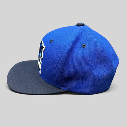 Raree Finds 2017 Taoyuan baseball snapback hat in royal blue with a navy brim and embroidered raven logo side view