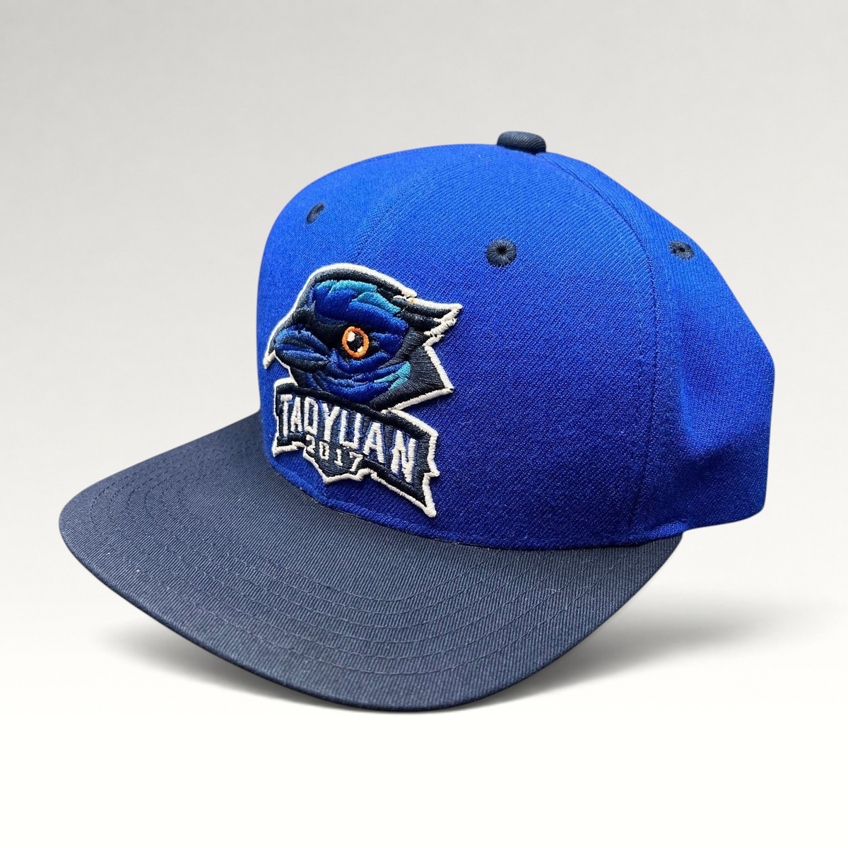 Raree Finds 2017 Taoyuan baseball snapback hat in royal blue with a navy brim and embroidered raven logo
