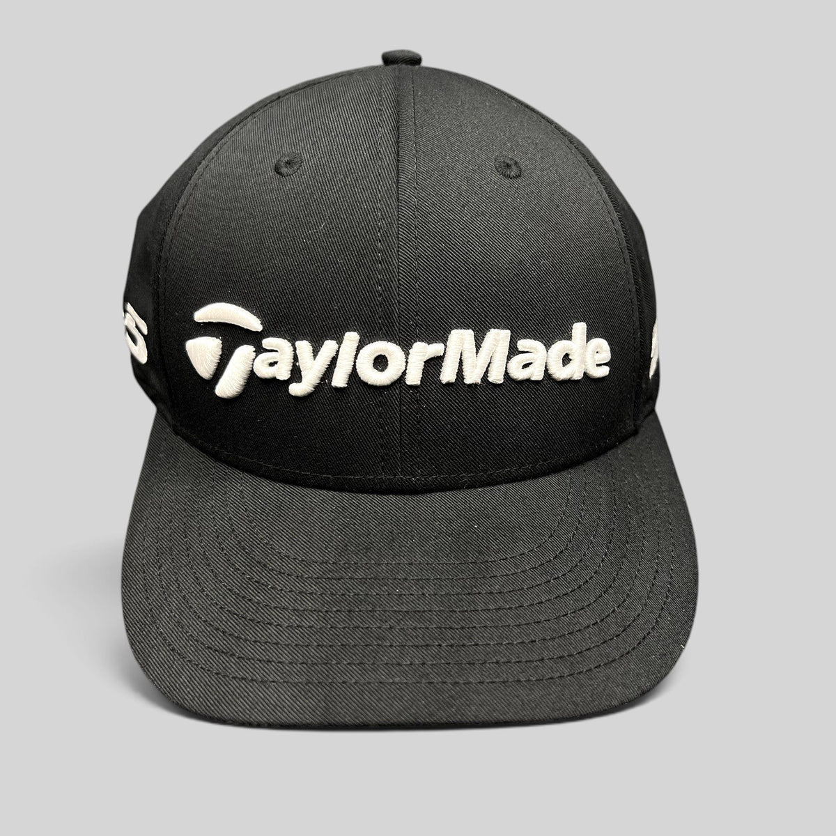 Raree Finds black TaylorMade golf snapback hat with raised white front embroidery and TP5 side branding
