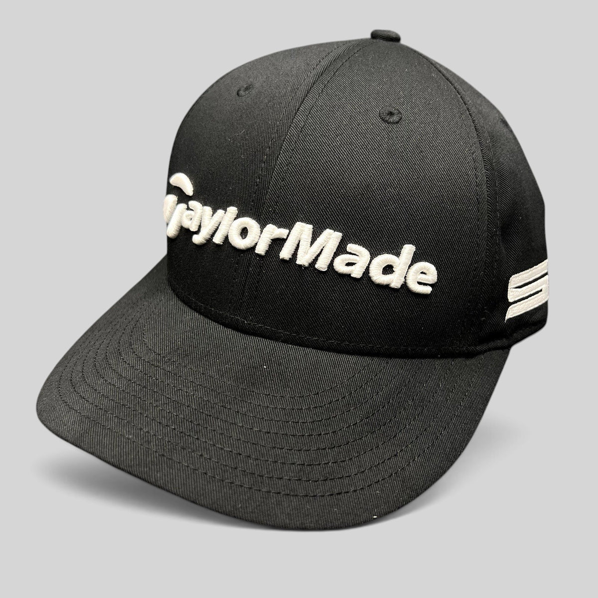 Raree Finds black TaylorMade golf snapback hat with raised white front embroidery and TP5 side branding