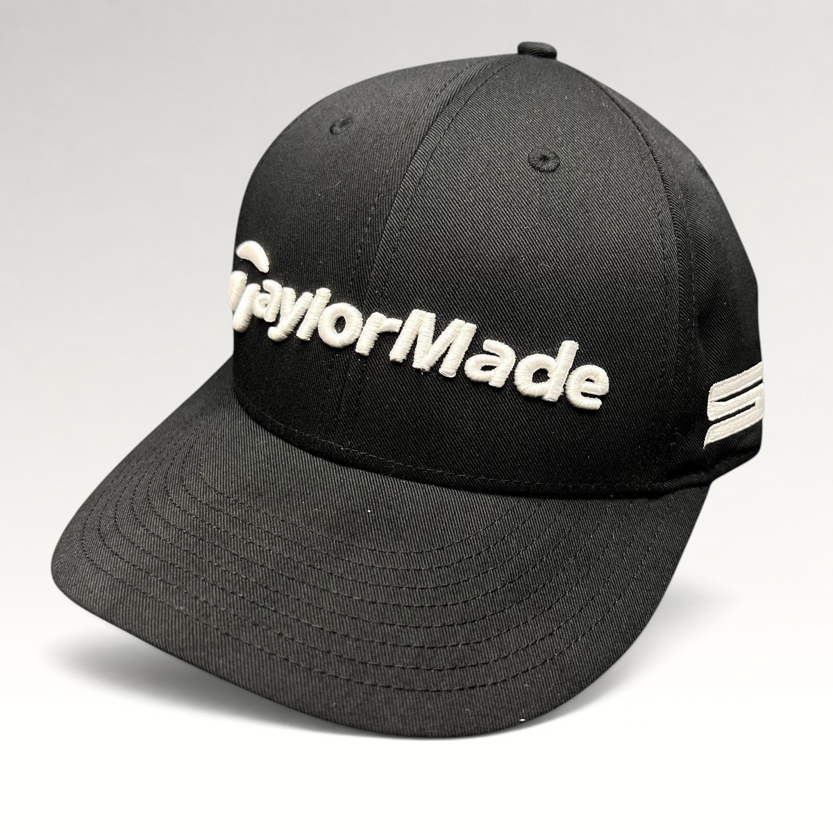 Raree Finds black TaylorMade golf snapback hat with raised white front embroidery and TP5 side branding