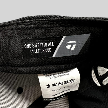 Raree Finds TaylorMade golf hat interior label showing one size fits all sizing and care instructions